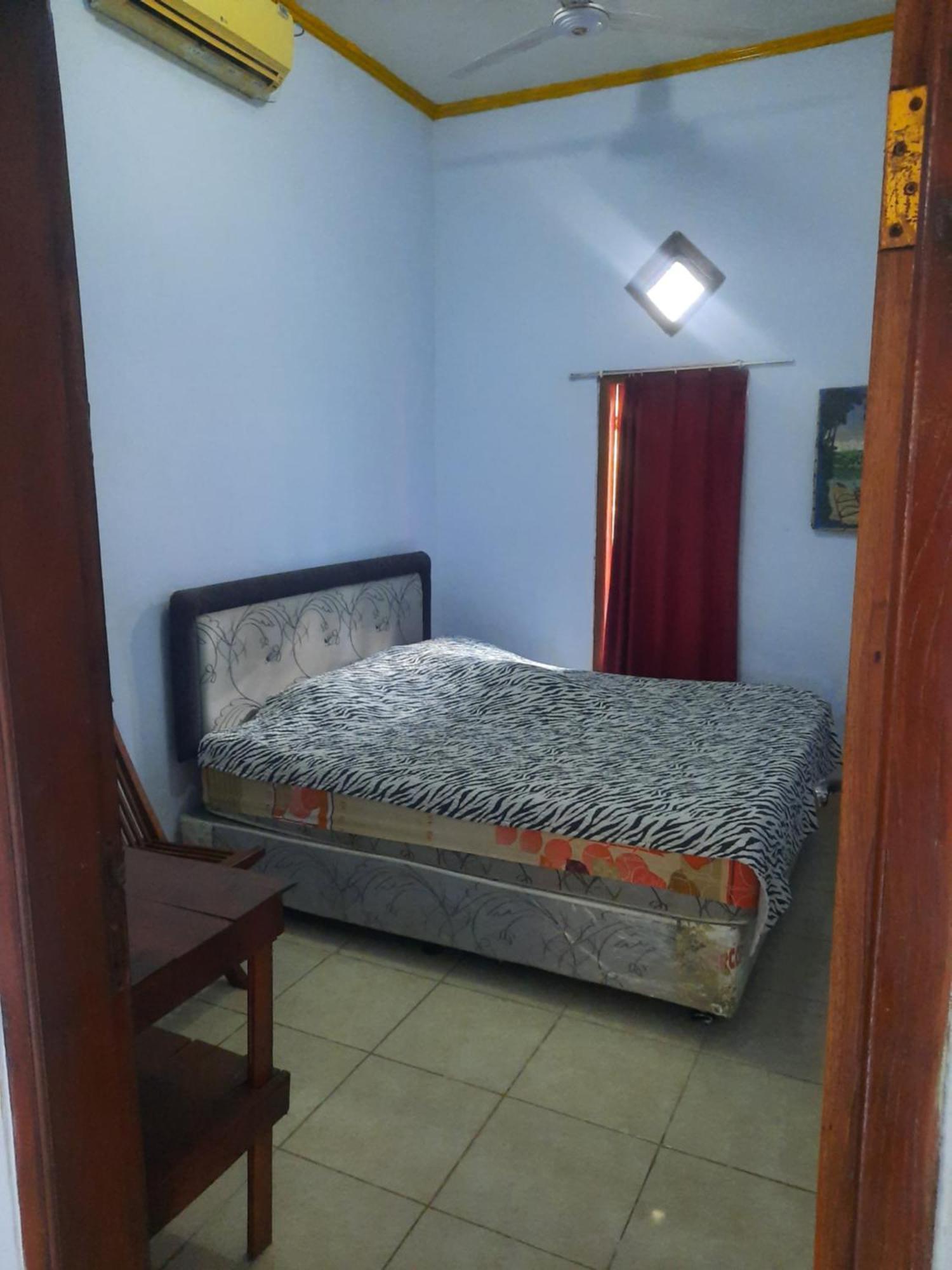 Red Beach Homestay Pasanggaran Camera foto